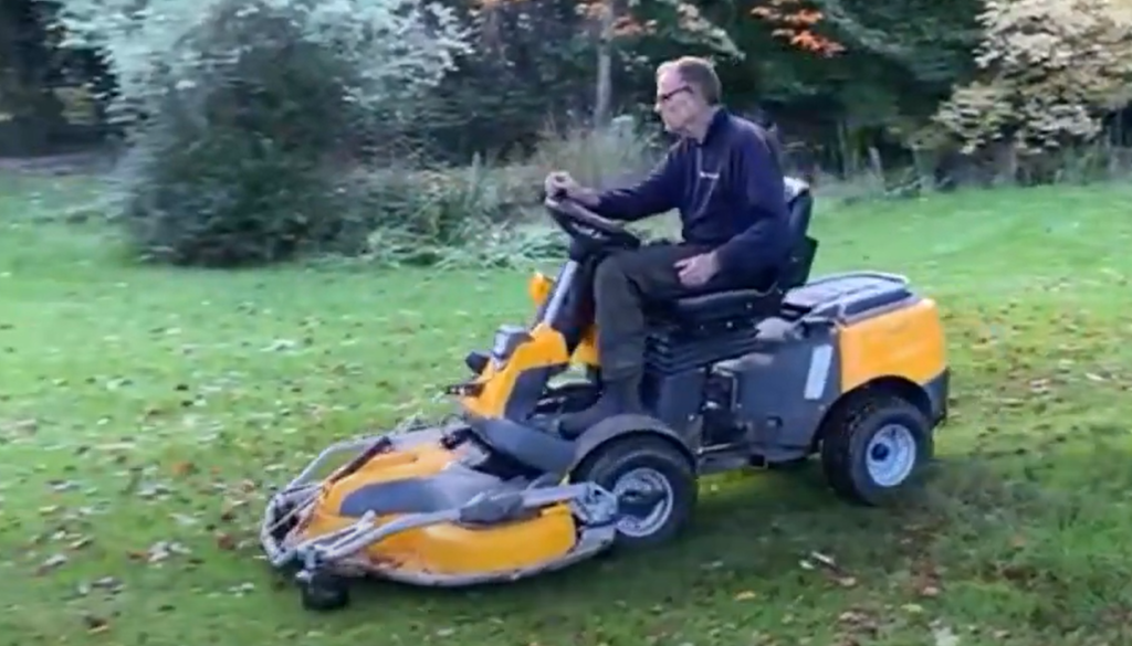 Ken drives a Stiga tractor lawn mower cutting grass.