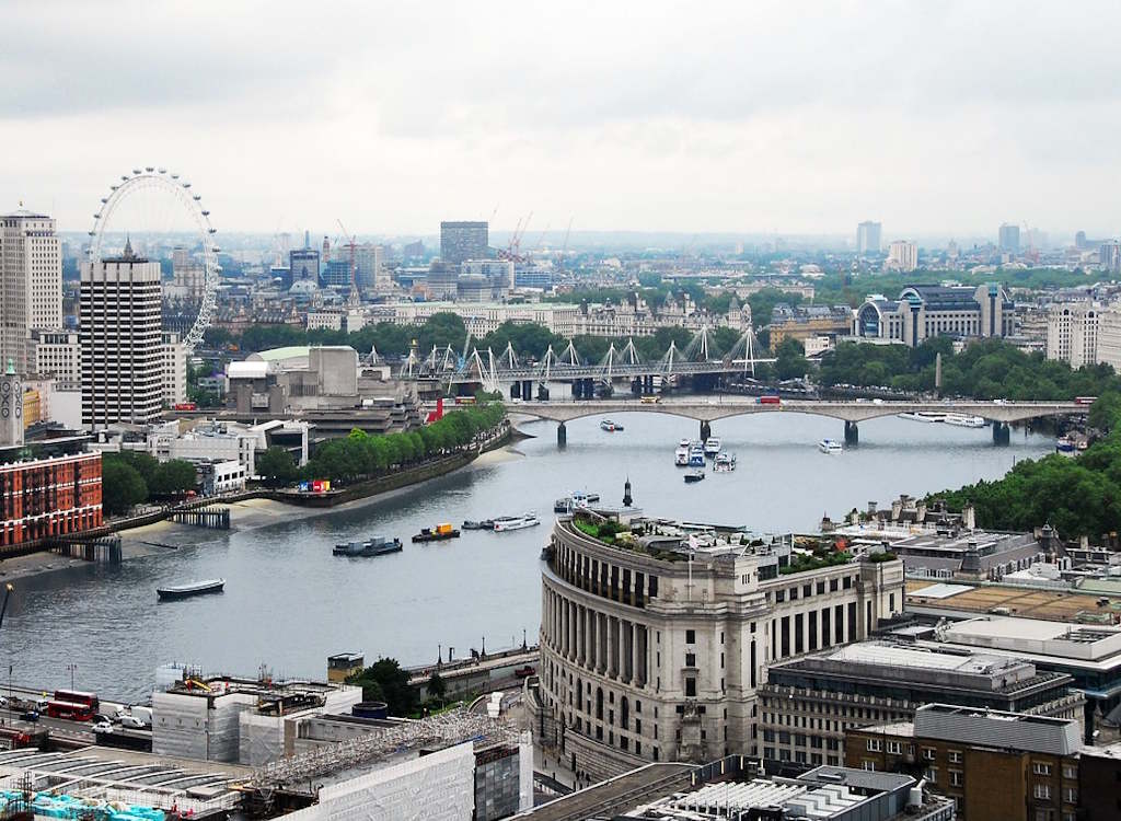 A view across central London towards the London Eye and south bank of the river Thames.