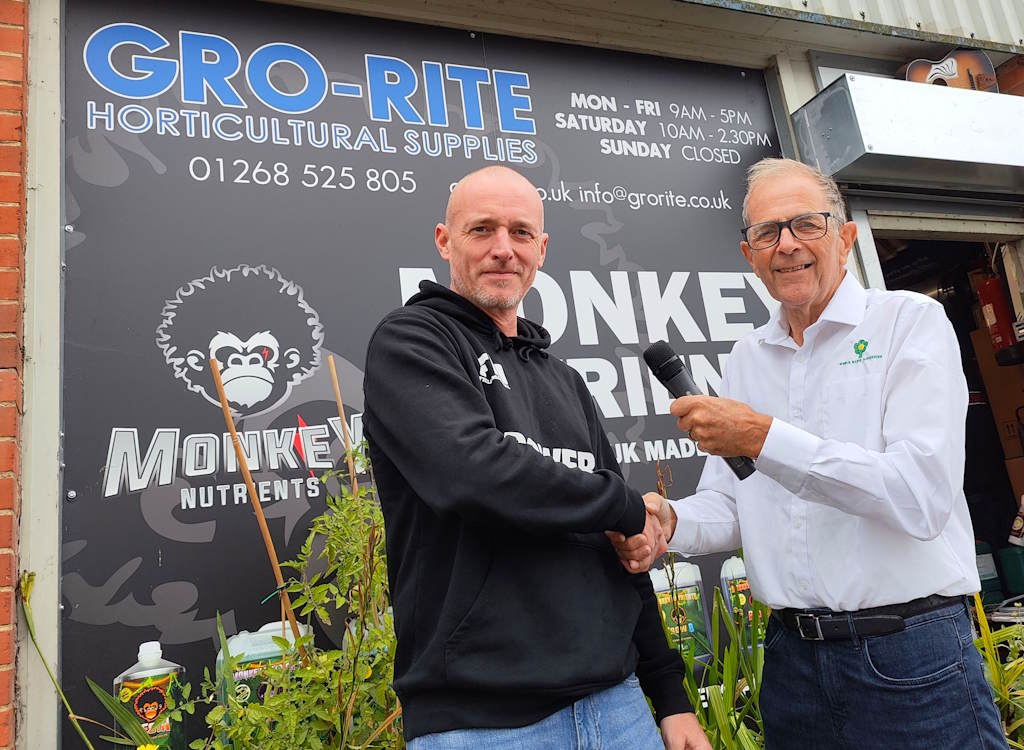 Gro-rite Horticulture's shop in Basildon with Ken and Danny Dawson shaking hands.