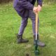 Planting autumn bulbs with hand tools