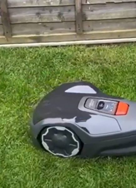 Robot mower from Husqvarna keeps on top of the grass lawn