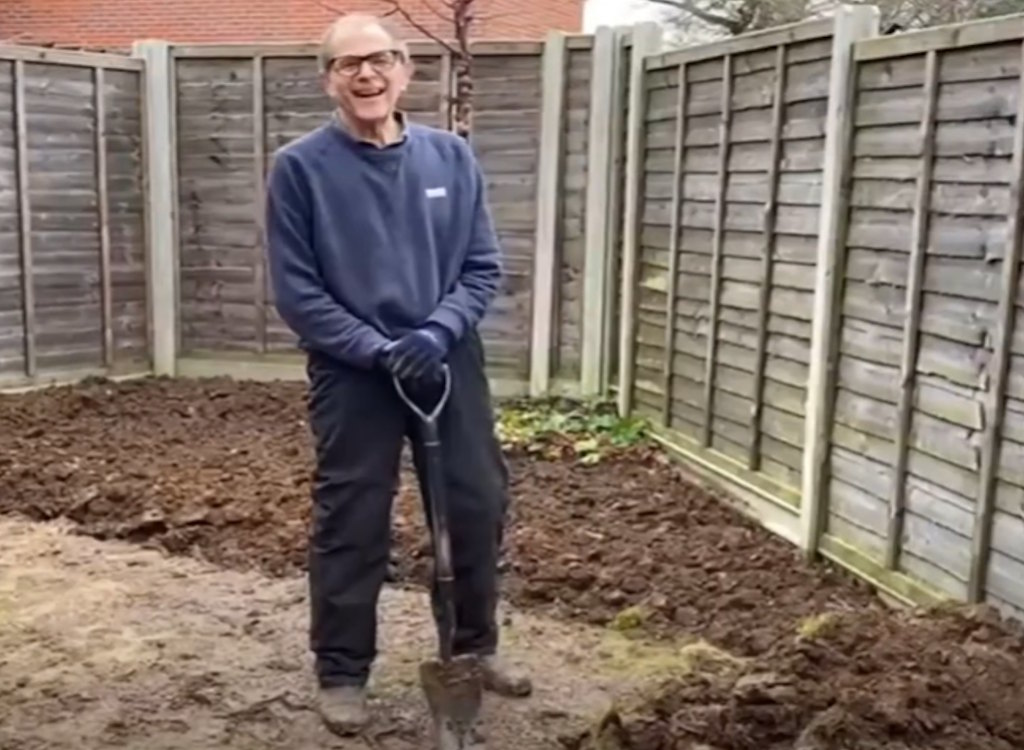 Ken digging in his backyard.