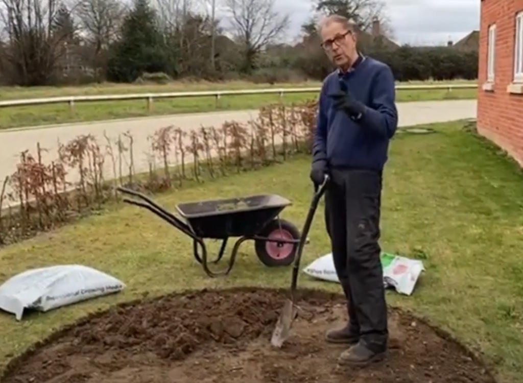 Ken digs a new bed at a new build property.