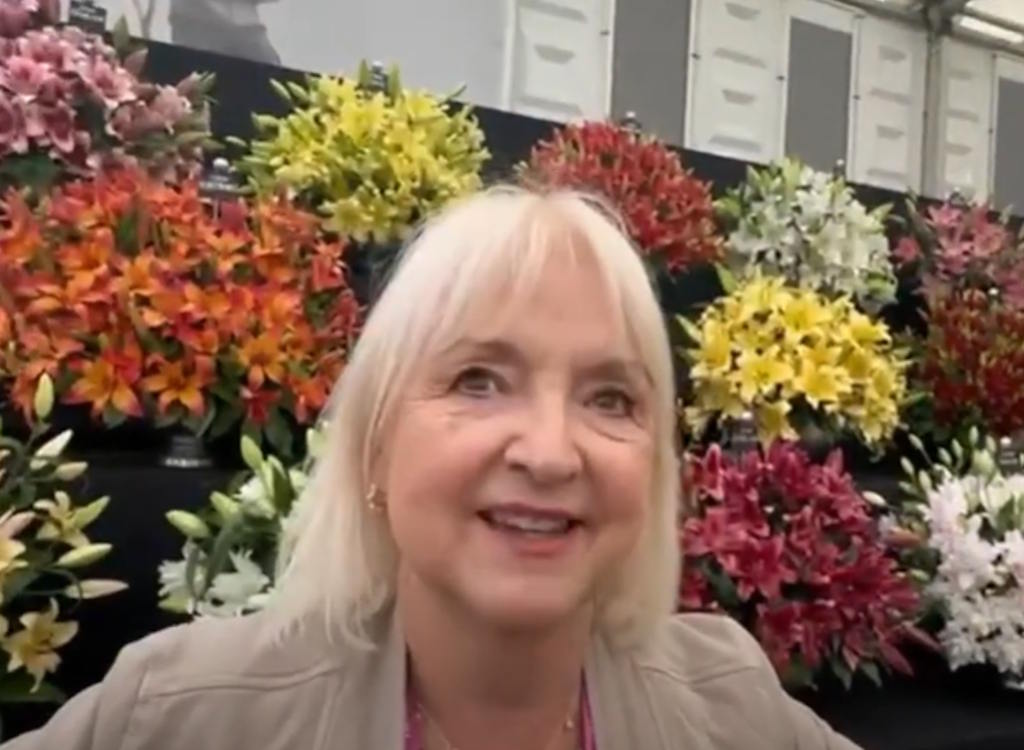 Lorraine Hart with her lily display at the Chelsea Flower Show.