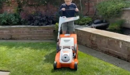 Youngster gets going with mowing
